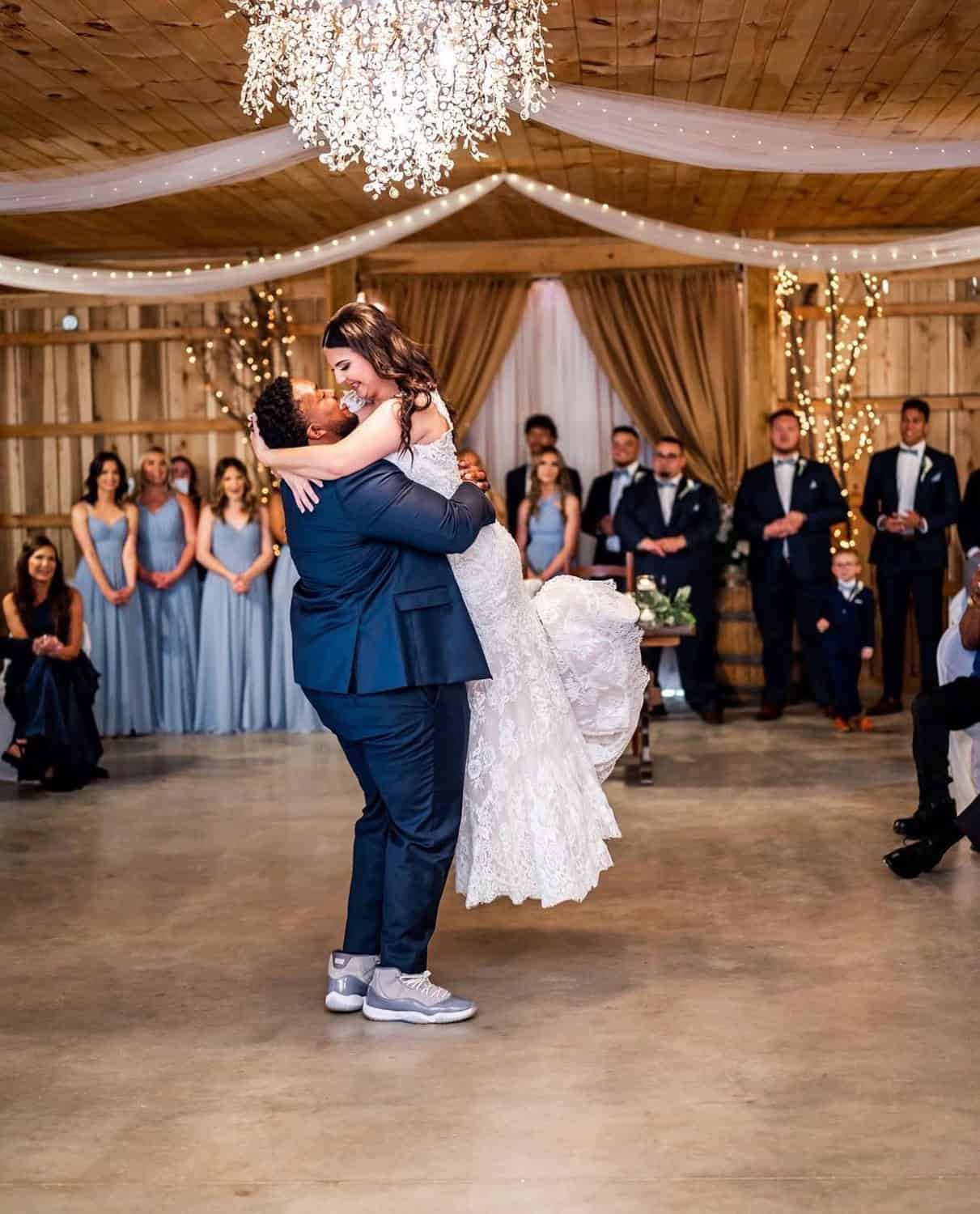Couple dancing at Mountain Ridge wedding venue with elegant decor.