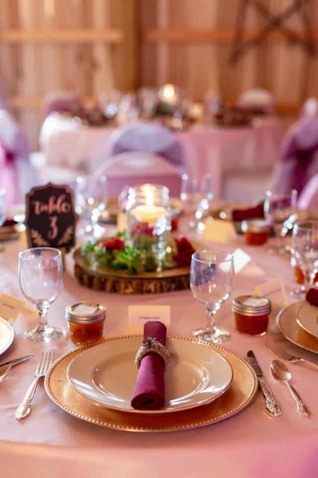 Elegant event setup at Mountain Ridge Venue with decorated tables and candles.