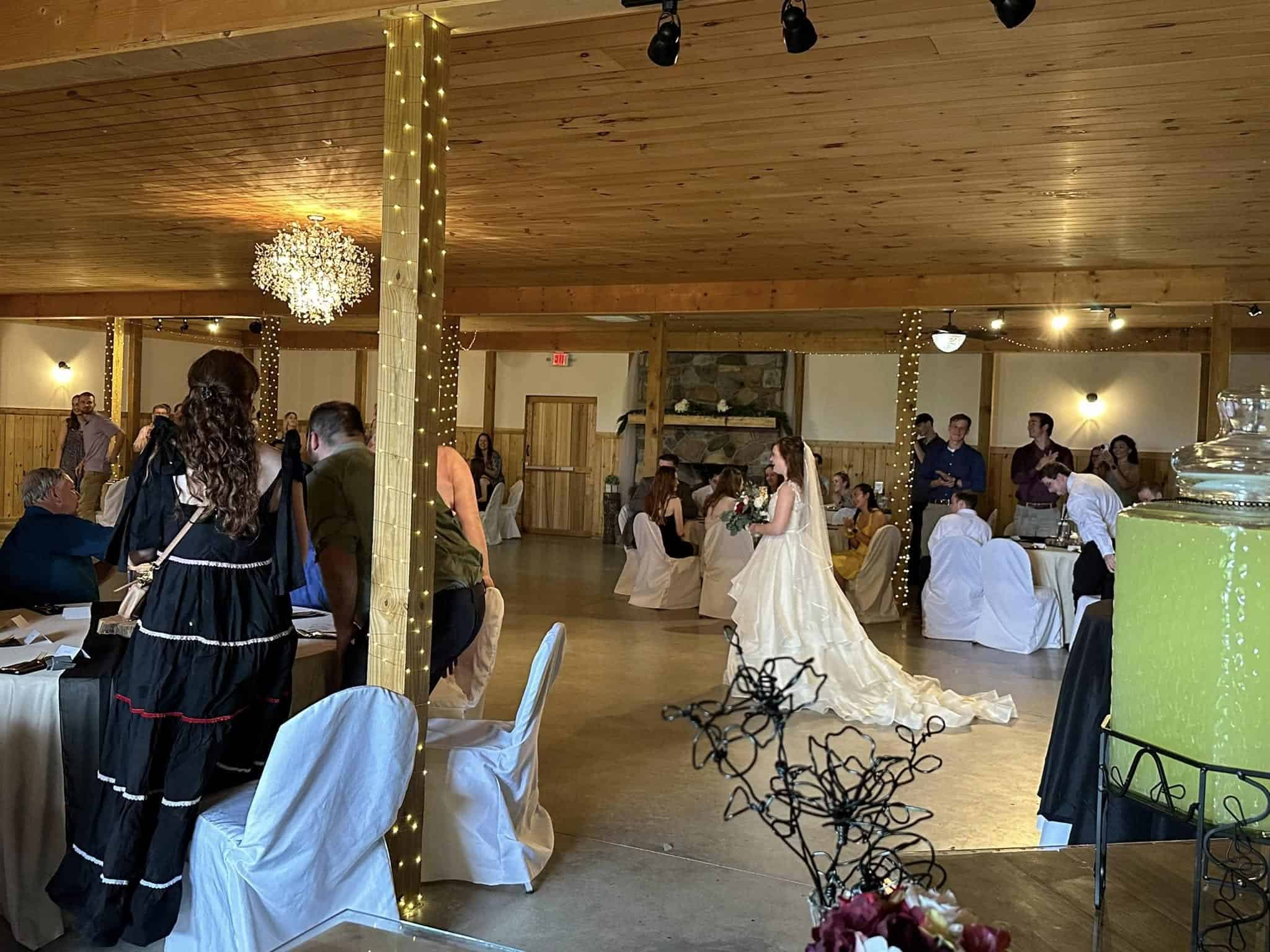 Wedding reception at Mountain Ridge Venue with elegant decor and guests.